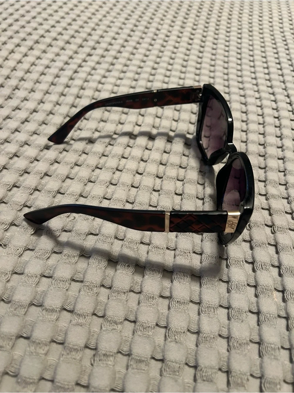 Jessica Simpson Black Cat-Eye Women's Sunglasses with Purple Lenses